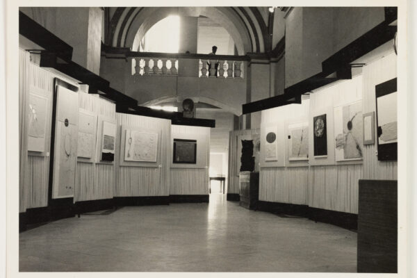 Emvin Cremona next to work, courtesy of The Cremona Family Archives